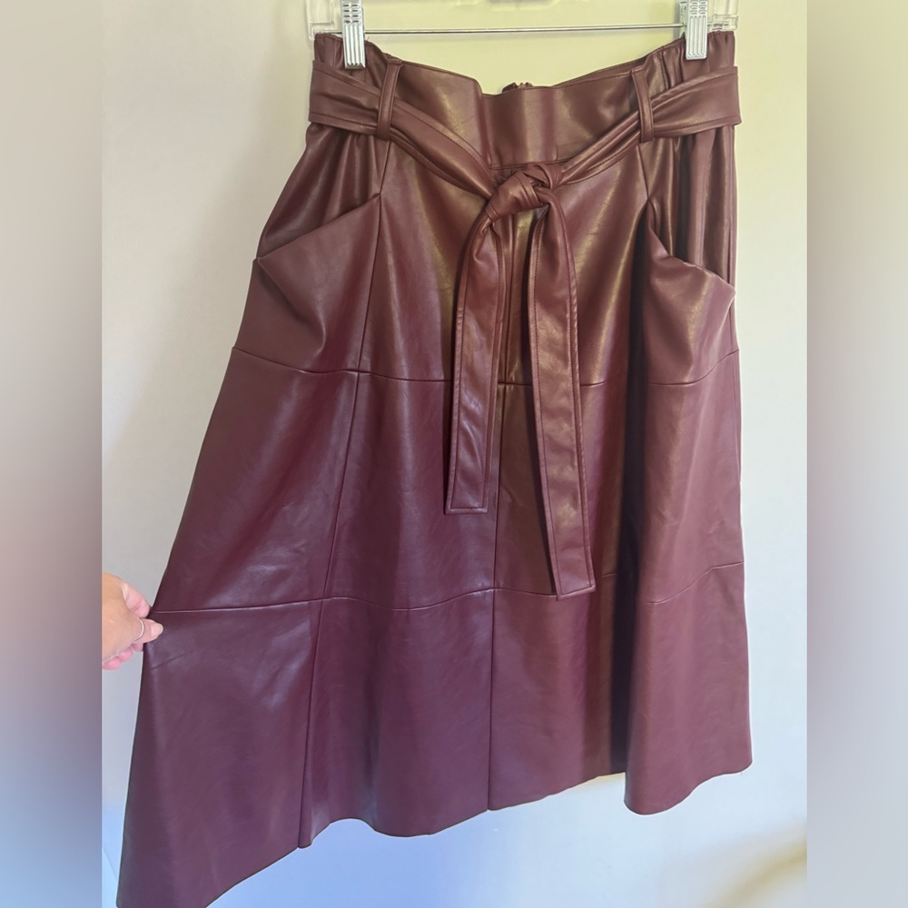 Vigoss Rich Burgundy long faux Leather belted skirt size Large
Vegan leather